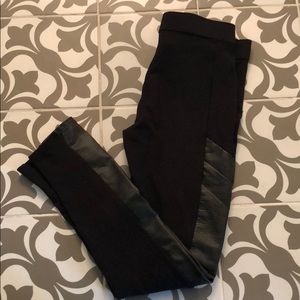 Black leggings with leather on the sides